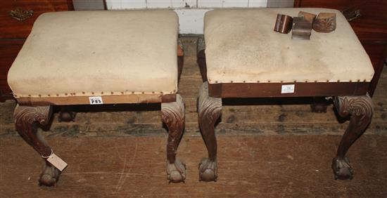 Pair of carved mahogany stools, upholstered seats